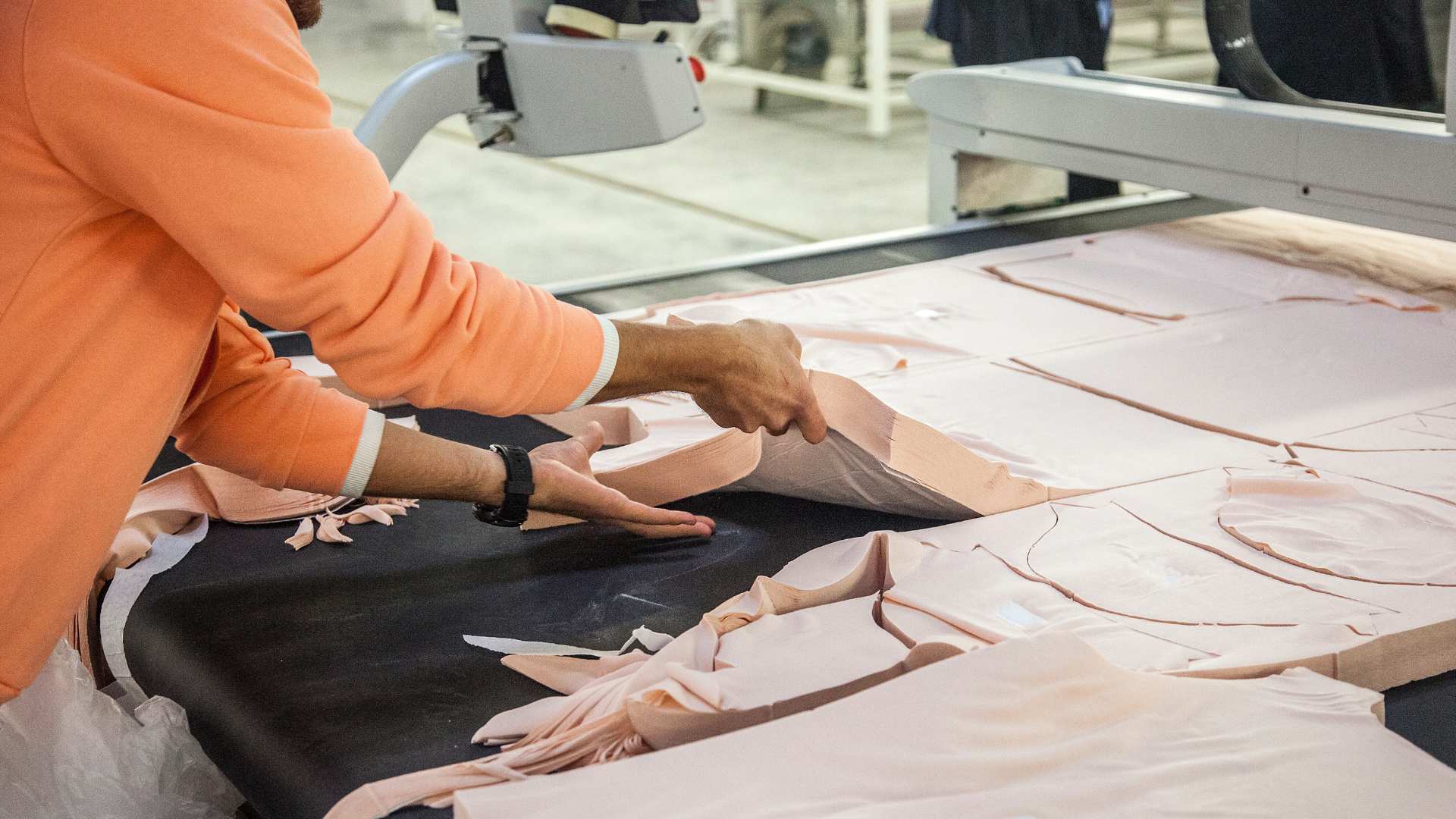 Woman cutting fabric